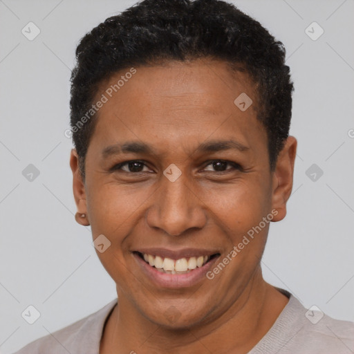 Joyful latino adult male with short  black hair and brown eyes
