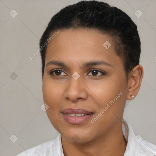 Joyful latino young-adult female with short  black hair and brown eyes