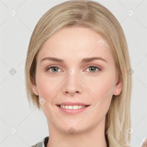 Joyful white young-adult female with medium  brown hair and blue eyes