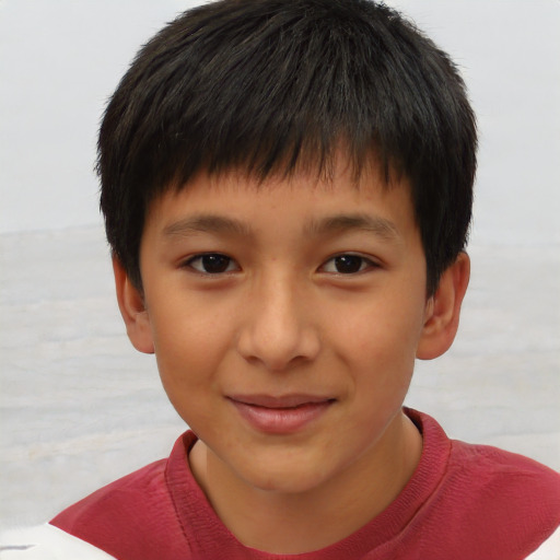 Joyful white child male with short  brown hair and brown eyes