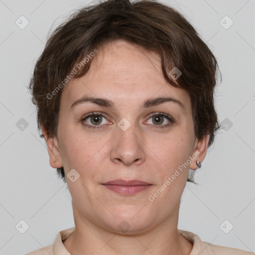 Joyful white young-adult female with short  brown hair and grey eyes