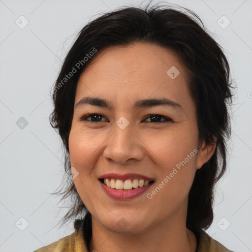 Joyful latino young-adult female with medium  brown hair and brown eyes