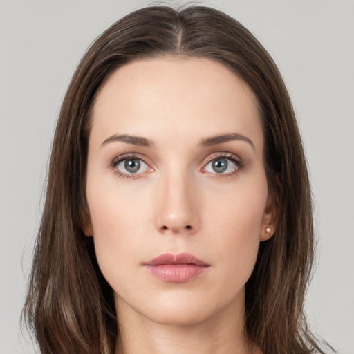 Neutral white young-adult female with long  brown hair and grey eyes