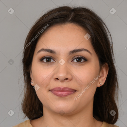 Joyful white young-adult female with medium  brown hair and brown eyes