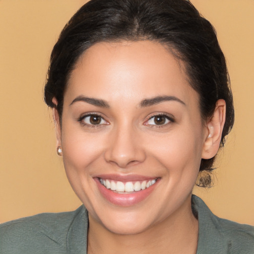 Joyful white young-adult female with medium  brown hair and brown eyes