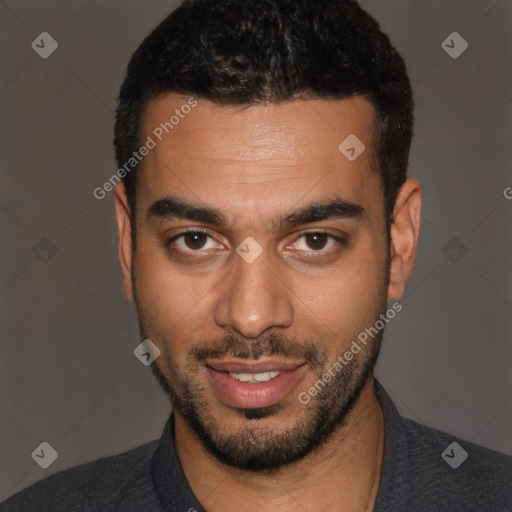 Joyful latino young-adult male with short  black hair and brown eyes