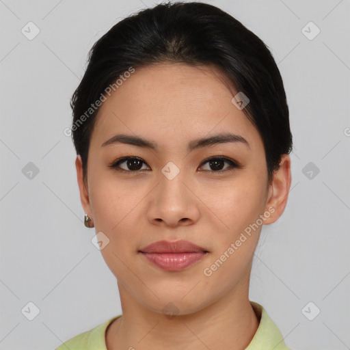 Joyful asian young-adult female with short  black hair and brown eyes