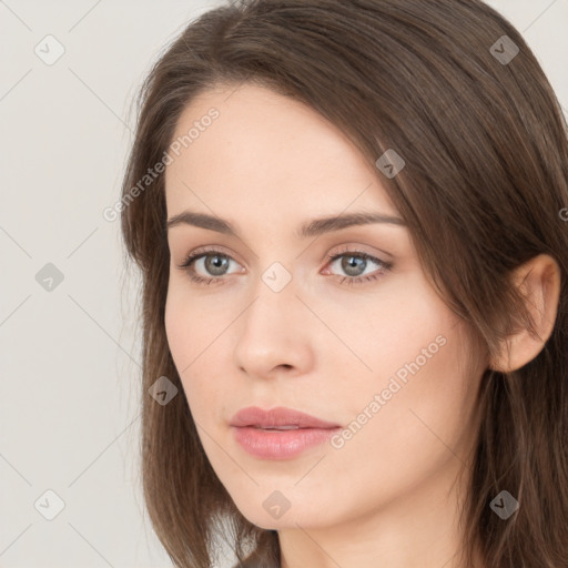 Neutral white young-adult female with long  brown hair and brown eyes