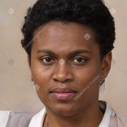 Joyful black young-adult female with short  brown hair and brown eyes