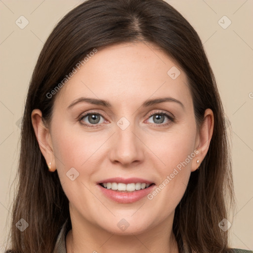 Joyful white young-adult female with long  brown hair and grey eyes