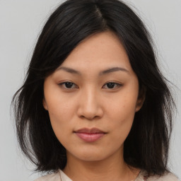 Neutral asian young-adult female with medium  brown hair and brown eyes