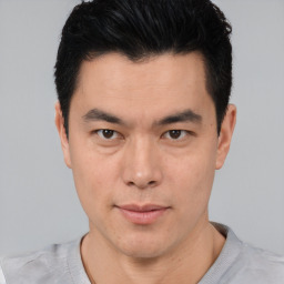 Neutral asian young-adult male with short  black hair and brown eyes