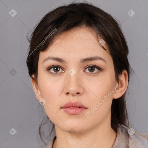 Neutral white young-adult female with medium  brown hair and brown eyes