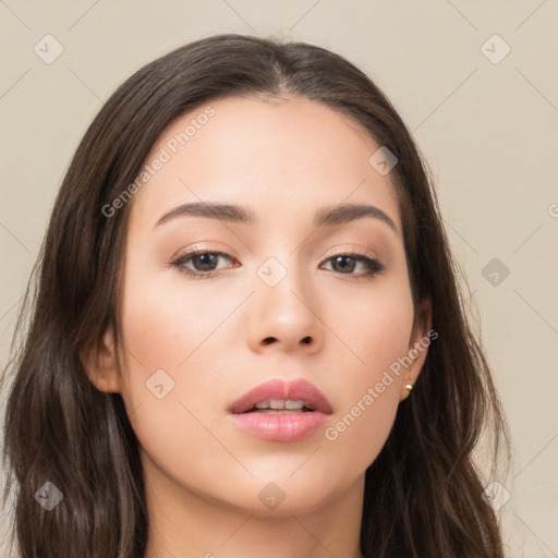 Neutral white young-adult female with long  brown hair and brown eyes