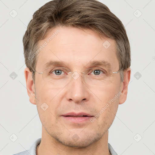 Joyful white adult male with short  brown hair and grey eyes