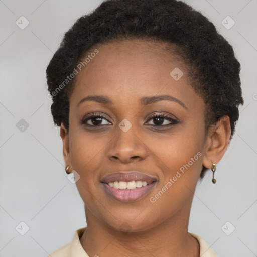 Joyful black young-adult female with short  brown hair and brown eyes