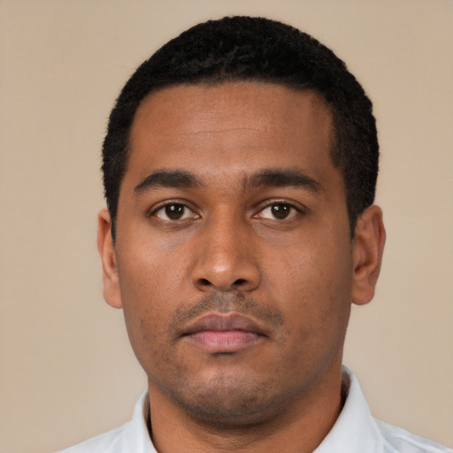 Neutral black young-adult male with short  black hair and brown eyes