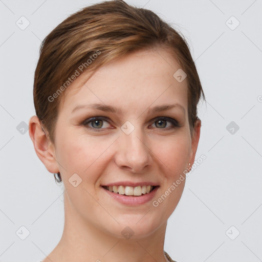 Joyful white young-adult female with short  brown hair and grey eyes