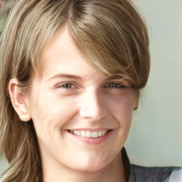 Joyful white young-adult female with medium  brown hair and green eyes