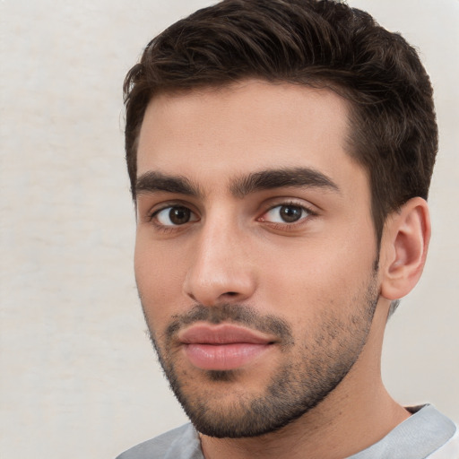 Neutral white young-adult male with short  brown hair and brown eyes