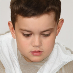 Neutral white child male with short  brown hair and brown eyes