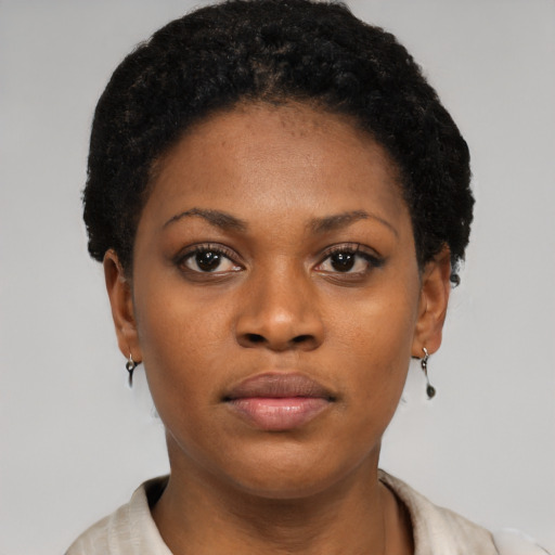 Neutral black young-adult female with short  black hair and brown eyes