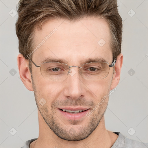 Joyful white adult male with short  brown hair and grey eyes