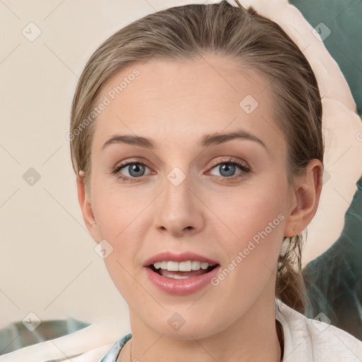 Joyful white young-adult female with medium  brown hair and grey eyes