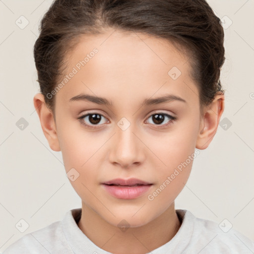 Joyful white child female with short  brown hair and brown eyes