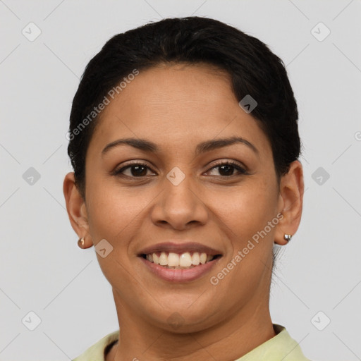 Joyful latino young-adult female with short  brown hair and brown eyes