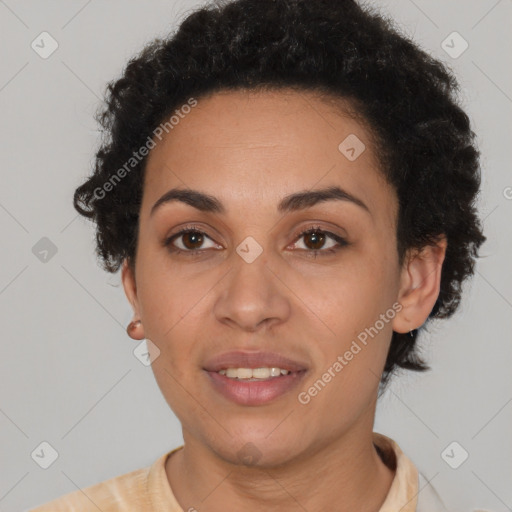 Joyful latino young-adult female with short  black hair and brown eyes