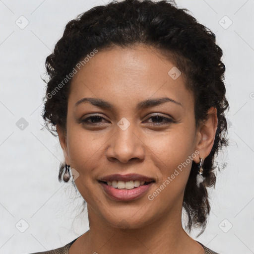 Joyful latino young-adult female with short  brown hair and brown eyes