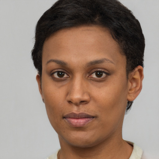 Neutral black young-adult female with short  brown hair and brown eyes