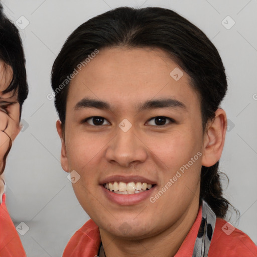 Joyful asian young-adult male with short  brown hair and brown eyes