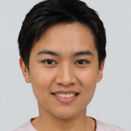 Joyful asian young-adult female with short  black hair and brown eyes