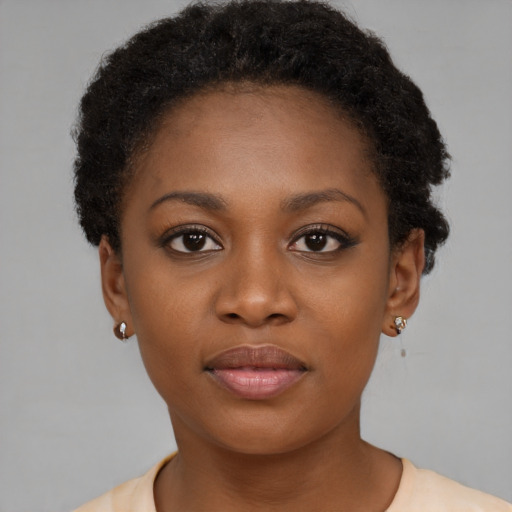 Neutral black young-adult female with short  brown hair and brown eyes