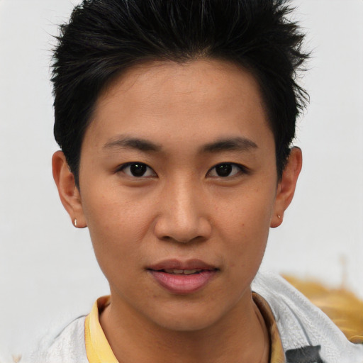 Joyful asian young-adult female with short  brown hair and brown eyes