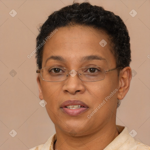 Joyful latino adult female with short  brown hair and brown eyes