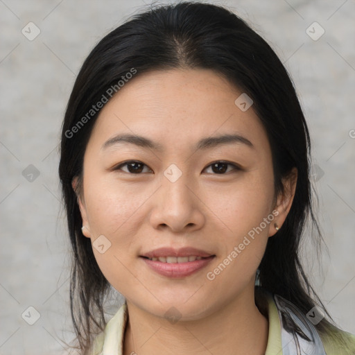 Joyful asian young-adult female with medium  brown hair and brown eyes