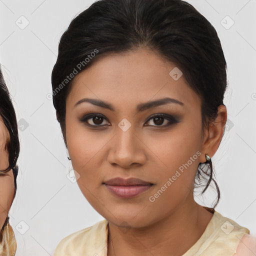 Joyful asian young-adult female with medium  brown hair and brown eyes