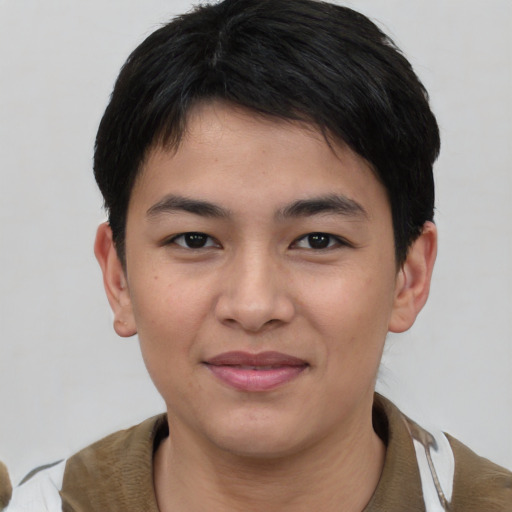 Joyful asian young-adult male with short  brown hair and brown eyes