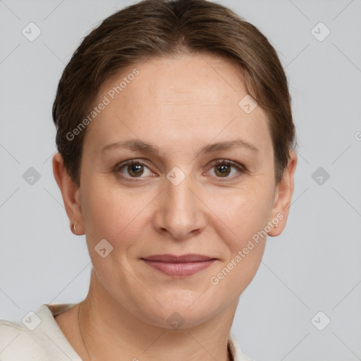 Joyful white young-adult female with short  brown hair and grey eyes