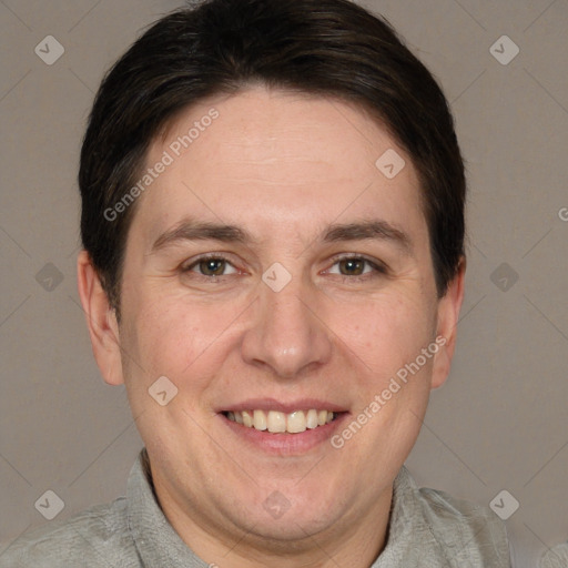 Joyful white adult male with short  brown hair and brown eyes