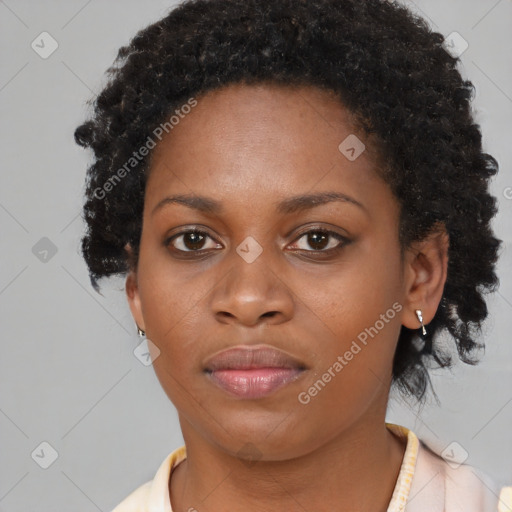 Neutral black young-adult female with short  brown hair and brown eyes