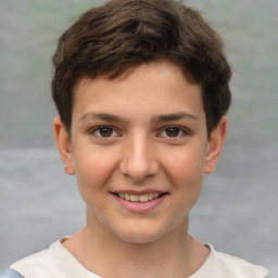 Joyful white child male with short  brown hair and brown eyes