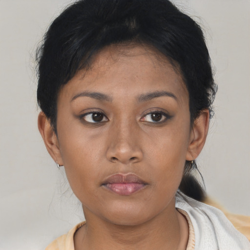 Neutral asian young-adult female with short  brown hair and brown eyes