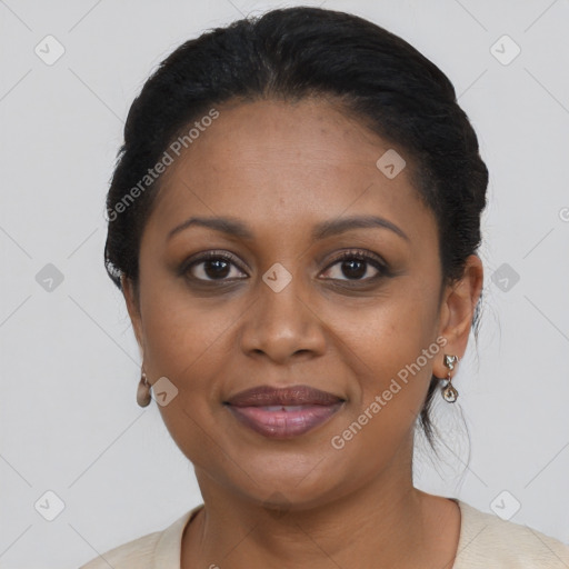 Joyful black young-adult female with medium  brown hair and brown eyes