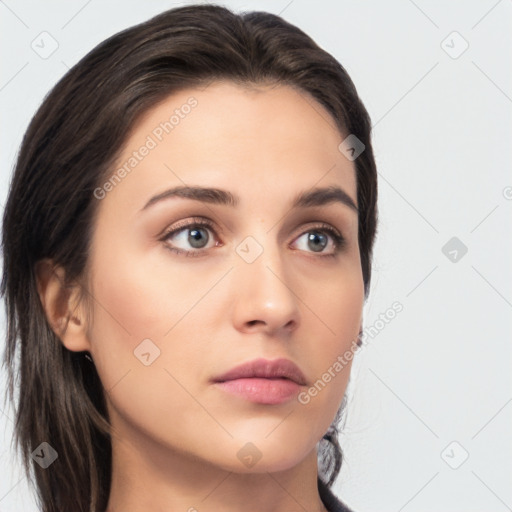 Neutral white young-adult female with medium  brown hair and brown eyes