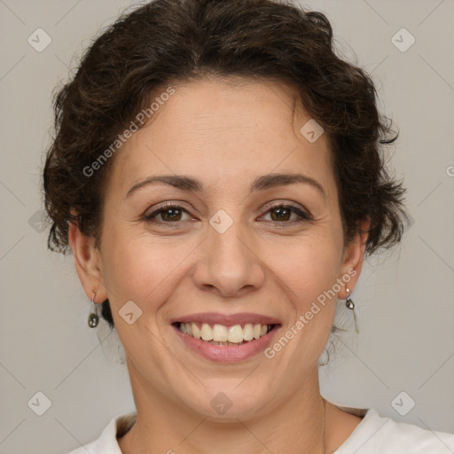 Joyful white adult female with short  brown hair and brown eyes