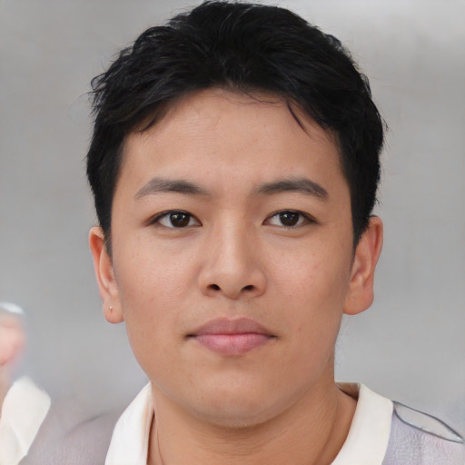 Neutral asian young-adult male with short  black hair and brown eyes